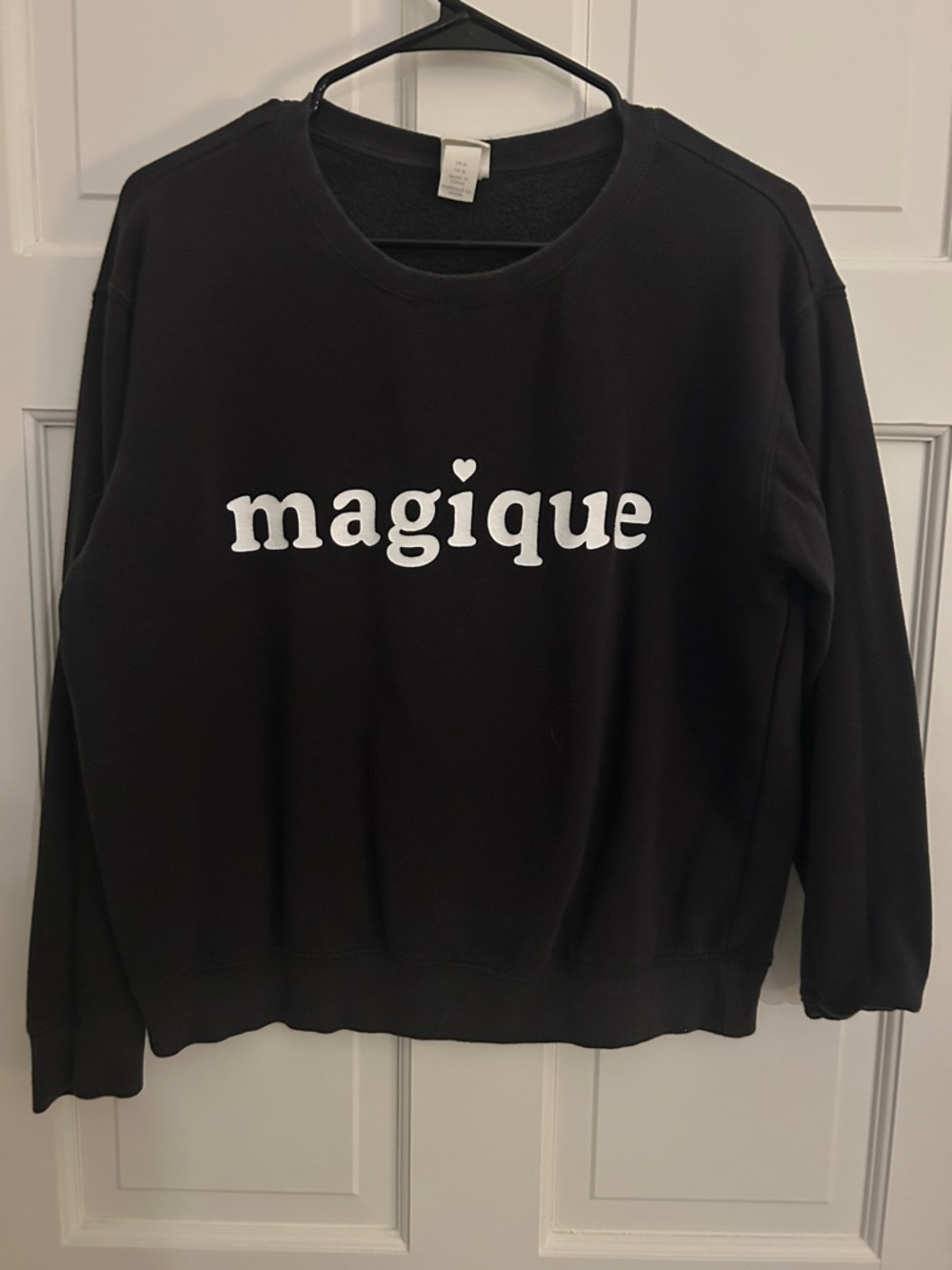 H&M Black Crewneck Sweatshirt with White "magique" Script